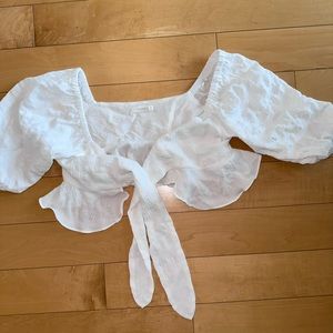 Tie front or back balloon sleeve top.